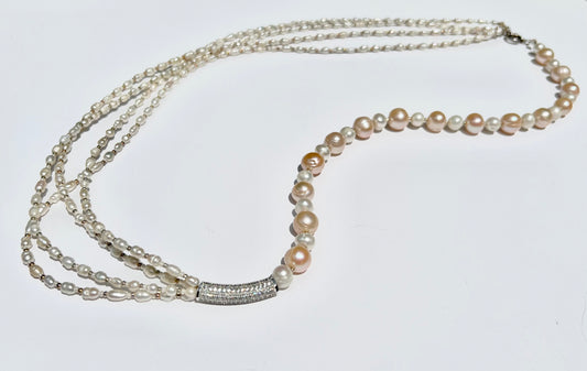 MULTILAYERED ASYMMETRIC PEARL NECKLACE